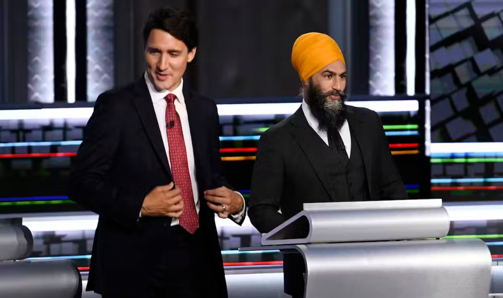 Justin Trudeau and Jagmeet Singh on the set of a live debate