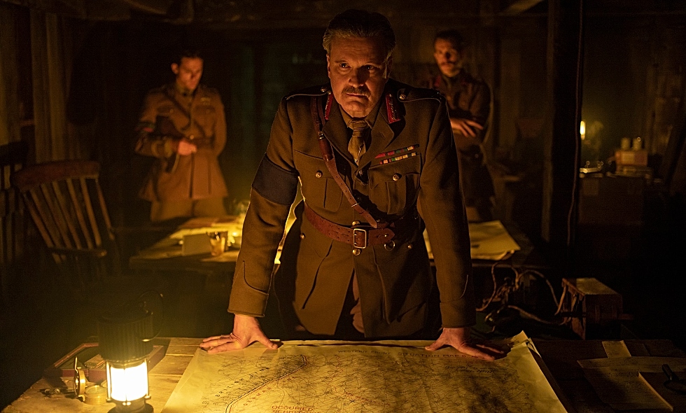 In this image from the film, 1917, Colin Firth as General Erinmore stands over a map from McMaster’s extensive World War One trench map collection. The map was modified slightly for use in the film. Image courtesy of Universal Pictures.