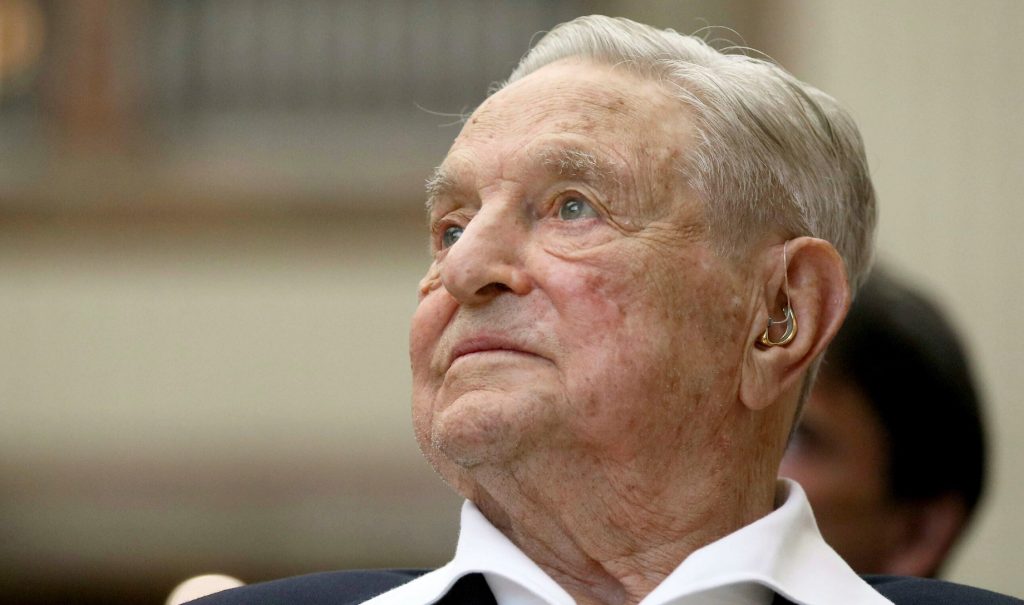 A closeup of George Soros' face.