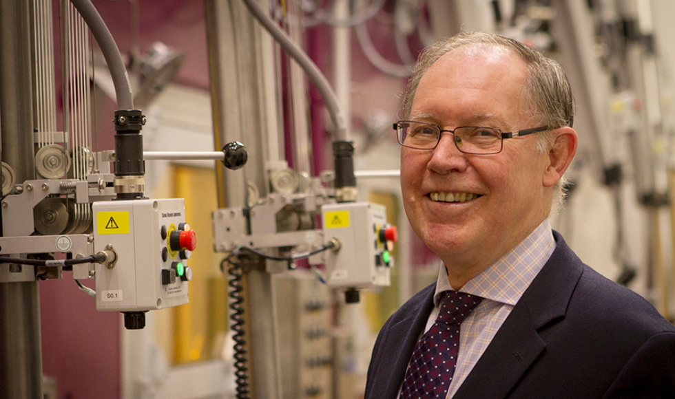 Headshot of Prof. John Luxat in the nuclear hot cell room