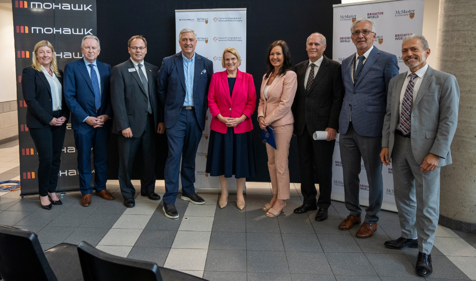 leaders from McMaster, Mohawk, HHS and St. Joes pose for a standing photo with with Ontario Health Minister Sylvia Jones.