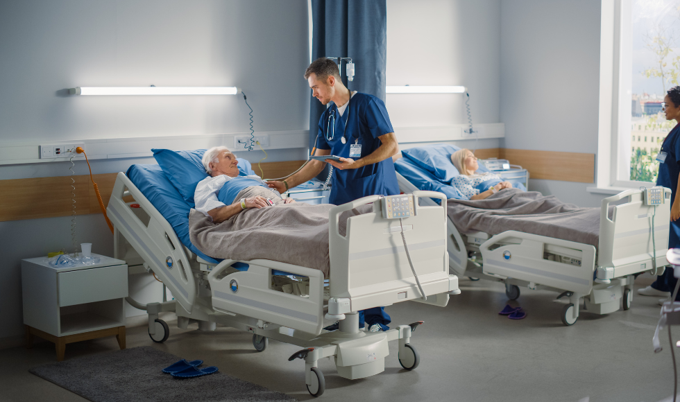 Image of doctor checking in on patient