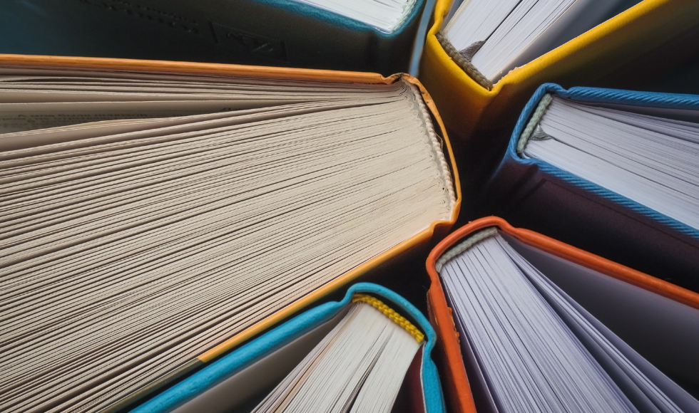 Spines of books from an overhead angle