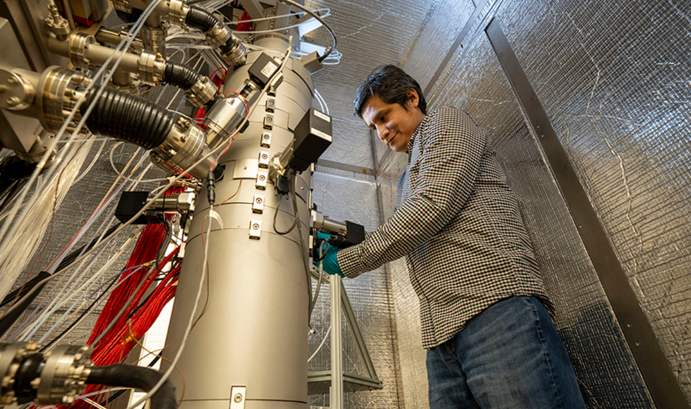 Dr. Maureen Joel Lagos working on the Nion HERMES 100 electron microscope.